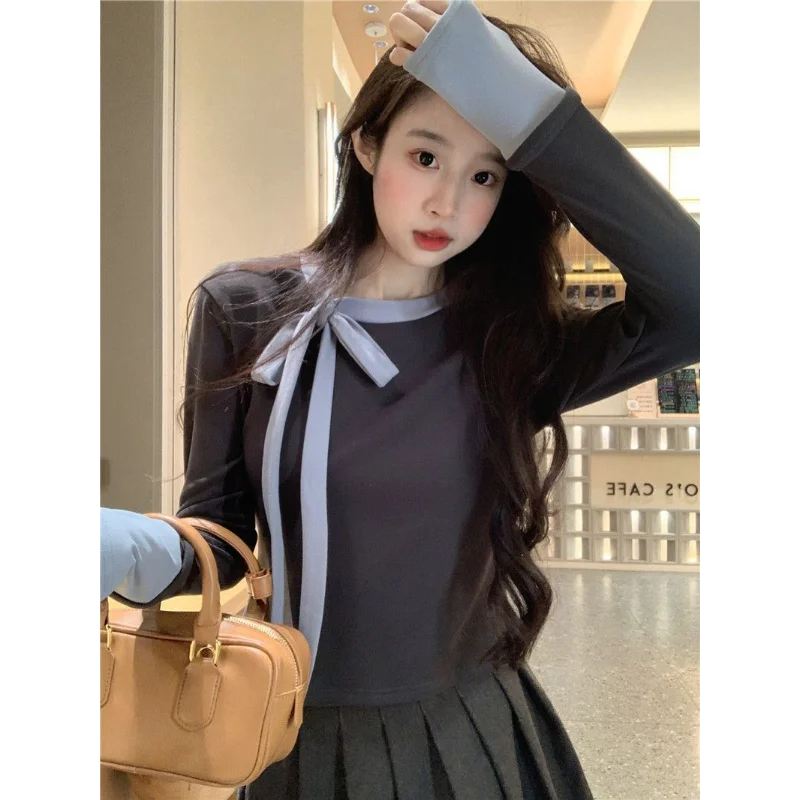 Элегантная футболка с длинным рукавом, женская винтажная футболка с бантом, ложный многослойный облегающий базовый топ
Элегантная футболка с длинным рукавом, женская винтажная футболка с бантом, ложный многослойный облегающий базовый топ