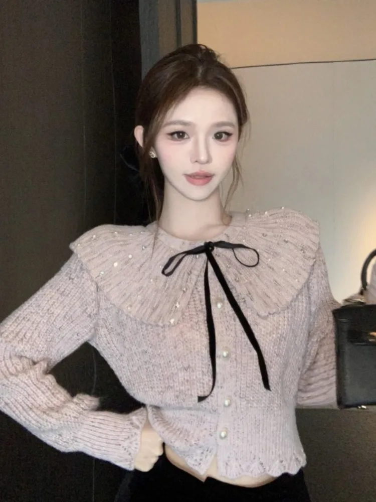 Elegant Doll Collar Sweater Women's Fashion Autumn Winter Pearl Button Knot Waist Cinched Short Knitted Shirt
Elegant Doll Collar Sweater Women's Fashion Autumn Winter Pearl Button Knot Waist Cinched Short Knitted Shirt