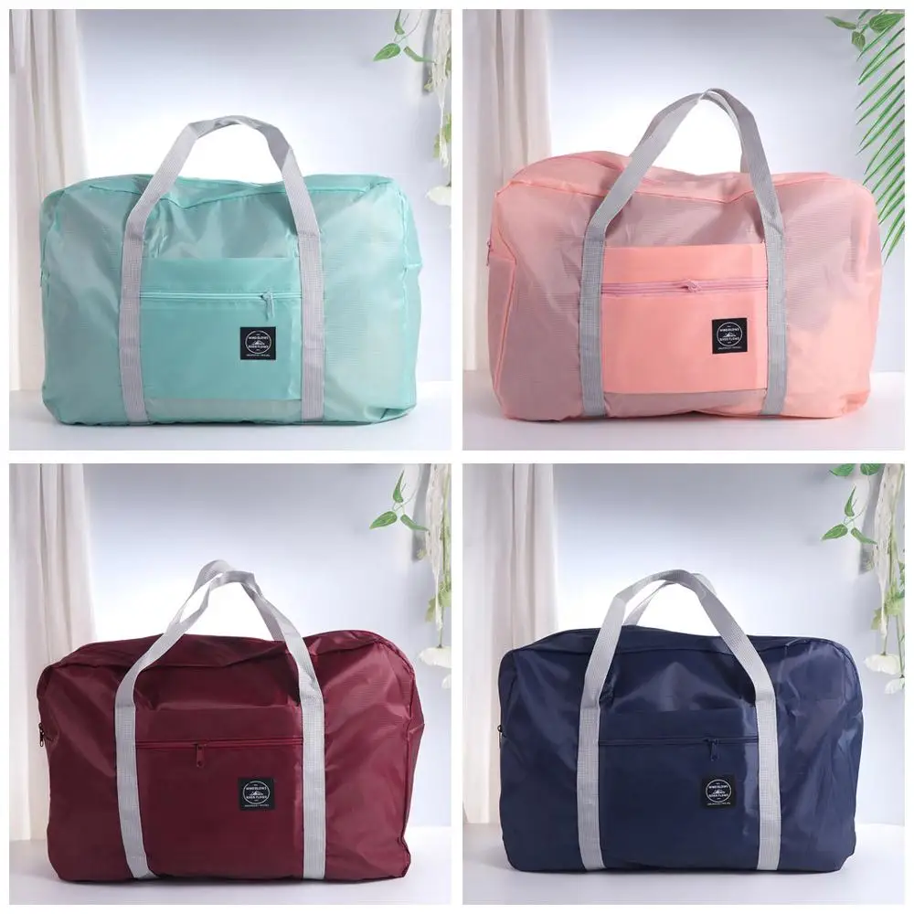 Nylon Fashion Waterproof Clothes Organizer Large Capacity Luggage Bag Travel Bags Storage Bag Handbags
Nylon Fashion Waterproof Clothes Organizer Large Capacity Luggage Bag Travel Bags Storage Bag Handbags