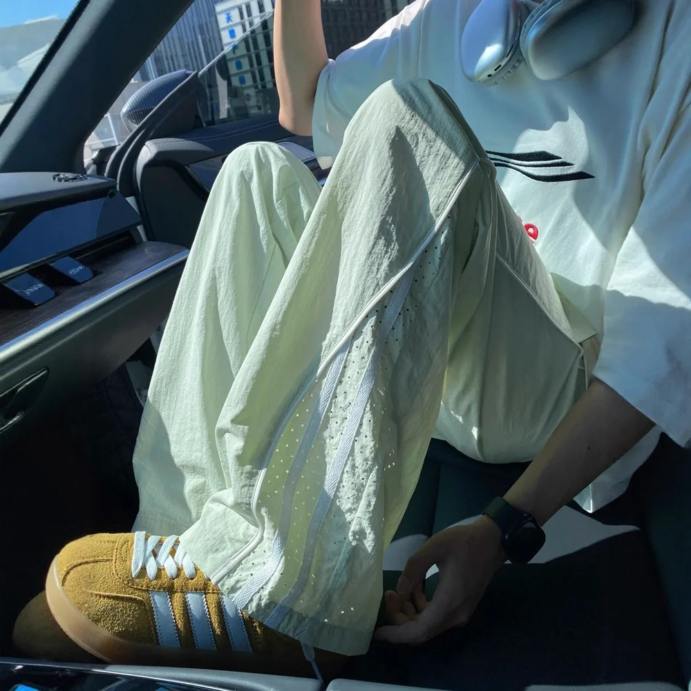 2026 New Summer Men's Dopamine Color Ice Silk Quick Dry Pants Mesh Spliced Striped Loose Straight Casual Sports Trousers
2026 New Summer Men's Dopamine Color Ice Silk Quick Dry Pants Mesh Spliced Striped Loose Straight Casual Sports Trousers