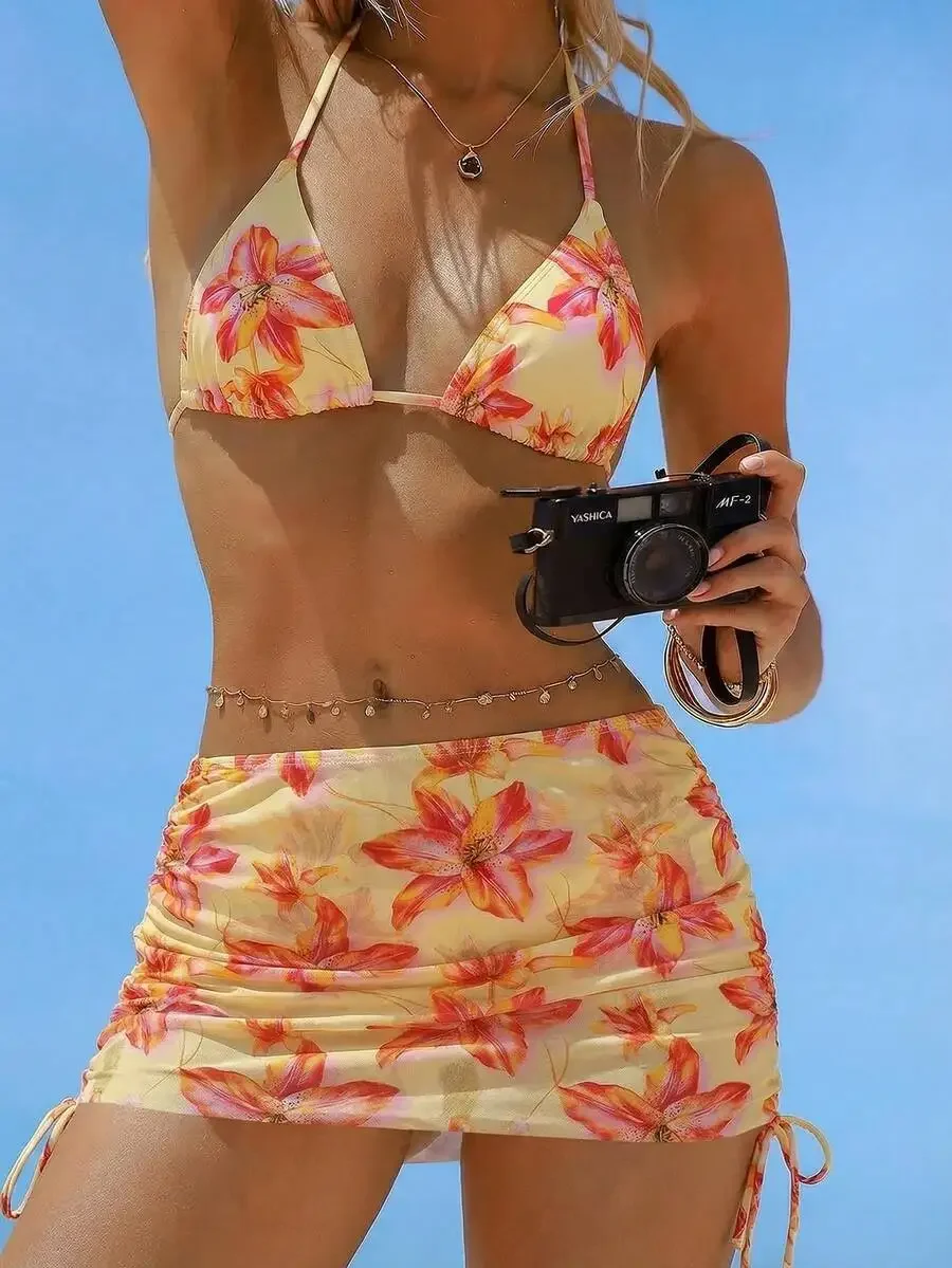 Yellow Floral Triangle Halter Bikini Top With Ruched Side-Tie Skirt And Matching Bottoms Three-Piece Swimwear For Women
Yellow Floral Triangle Halter Bikini Top With Ruched Side-Tie Skirt And Matching Bottoms Three-Piece Swimwear For Women