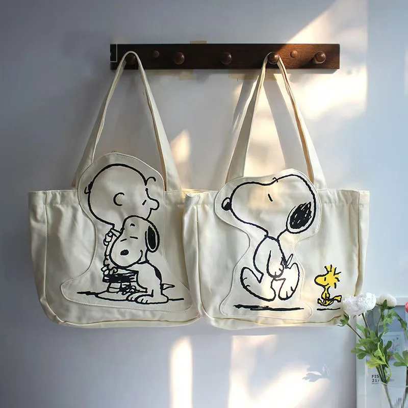 Kawaii Snoopy Cartoon Cute Little Fresh Shoulder Bag Large Capacity Canvas Bag Fashionable Versatile Handbag Shopping Bag
Kawaii Snoopy Cartoon Cute Little Fresh Shoulder Bag Large Capacity Canvas Bag Fashionable Versatile Handbag Shopping Bag