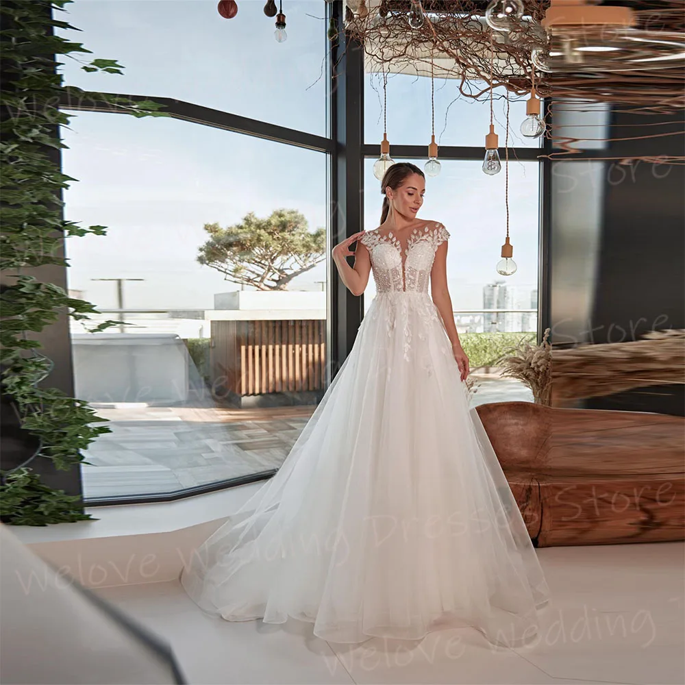 Graceful A Line Women's Wedding Dresses Modern Beautiful Appliques Lace Bride Gowns Fascinating Cap Sleeve Vestidos Novias Boda
Graceful A Line Women's Wedding Dresses Modern Beautiful Appliques Lace Bride Gowns Fascinating Cap Sleeve Vestidos Novias Boda