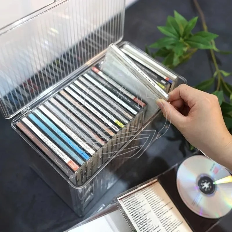 Пыленепроницаемый ящик для хранения с крышкой, подходит для CD-дисков и игровых дисков Switch.
Пыленепроницаемый ящик для хранения с крышкой, подходит для CD-дисков и игровых дисков Switch.