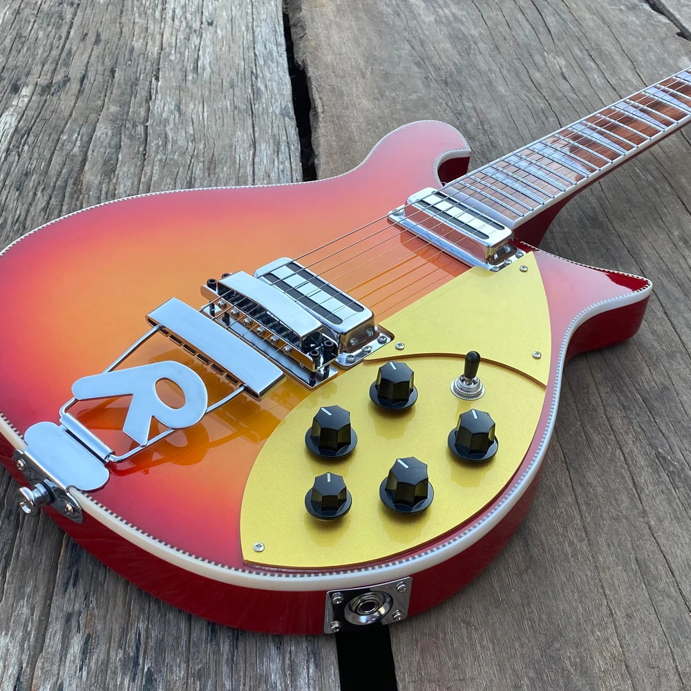 Электрогитара 660, 6-струнная струнная лада вишневого цвета Sunburst, нержавеющая сталь, мост "R", золотая накладка, шахматная доска, связывающая гитараra
Электрогитара 660, 6-струнная струнная лада вишневого цвета Sunburst, нержавеющая сталь, мост "R", золотая накладка, шахматная доска, связывающая гитараra