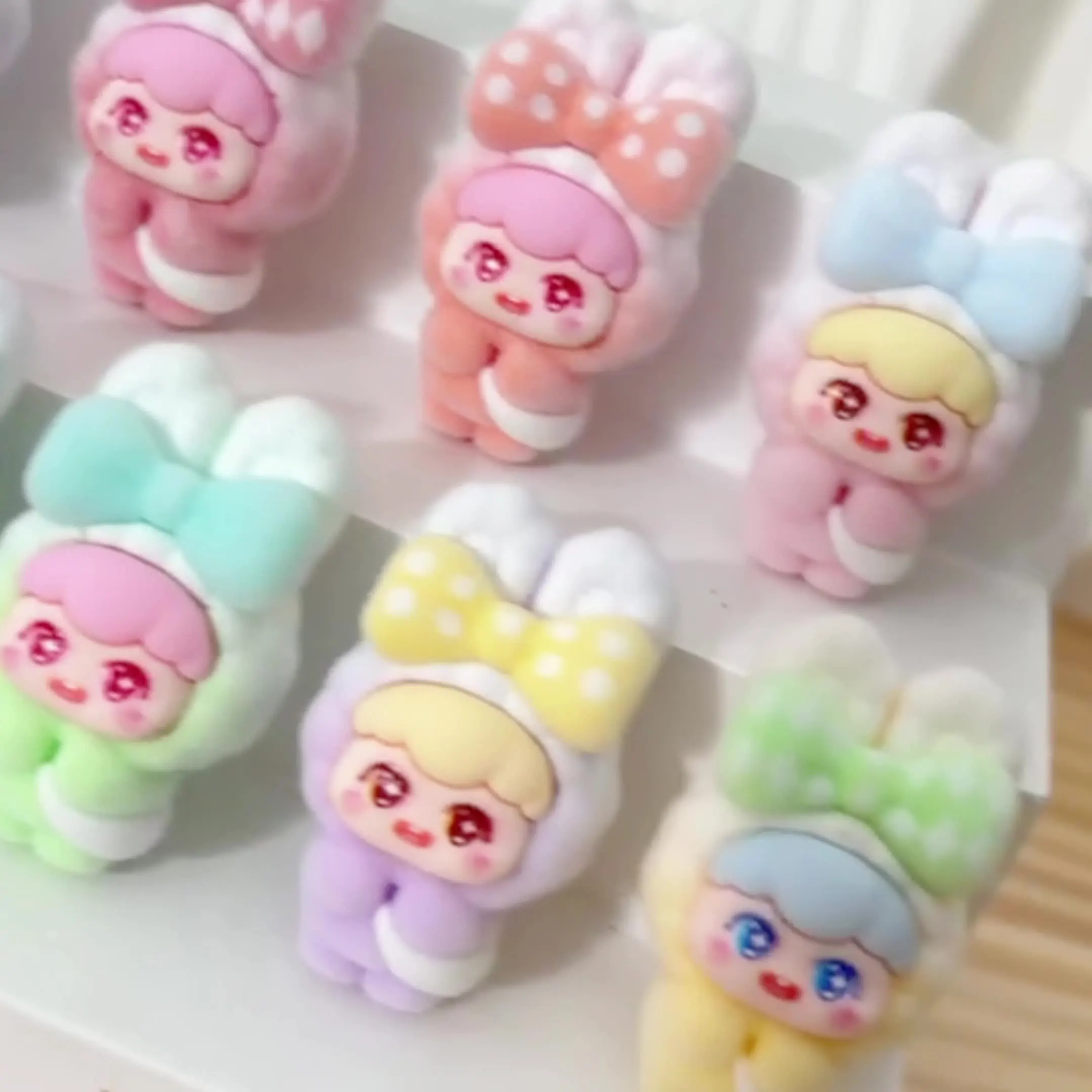 9pcs Cartoon bow-tie little rabbit cute little figurine for desktop decoration and mini display piece 
9pcs Cartoon bow-tie little rabbit cute little figurine for desktop decoration and mini display piece