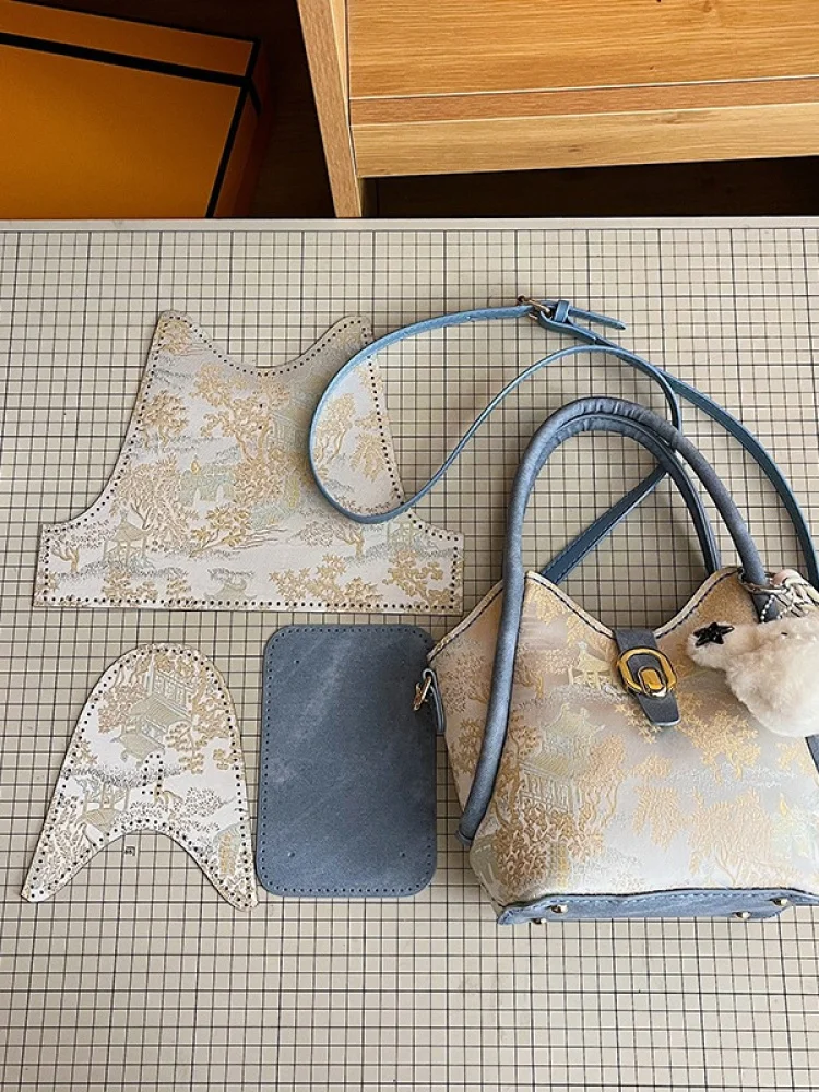 Новый комплект материалов для ручной работы «сделай сам», модная уличная сумка-ведро из искусственной кожи, сумка на плечо с застежкой-молнией, повседневное использование
Новый комплект материалов для ручной работы «сделай сам», модная уличная сумка-ведро из искусственной кожи, сумка на плечо с застежкой-молнией, повседневное использование