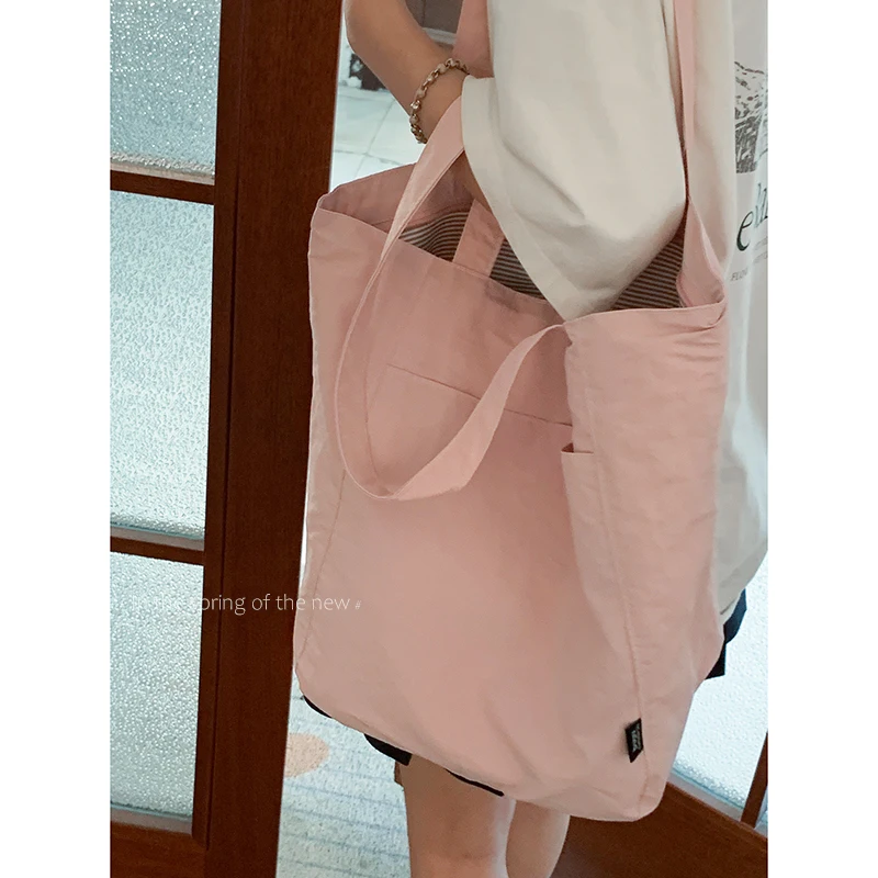 Korean Versatile Large Capacity Shoulder Tote Bag for Women 2025 New Fashion College Sail Cloth Bags
Korean Versatile Large Capacity Shoulder Tote Bag for Women 2025 New Fashion College Sail Cloth Bags
