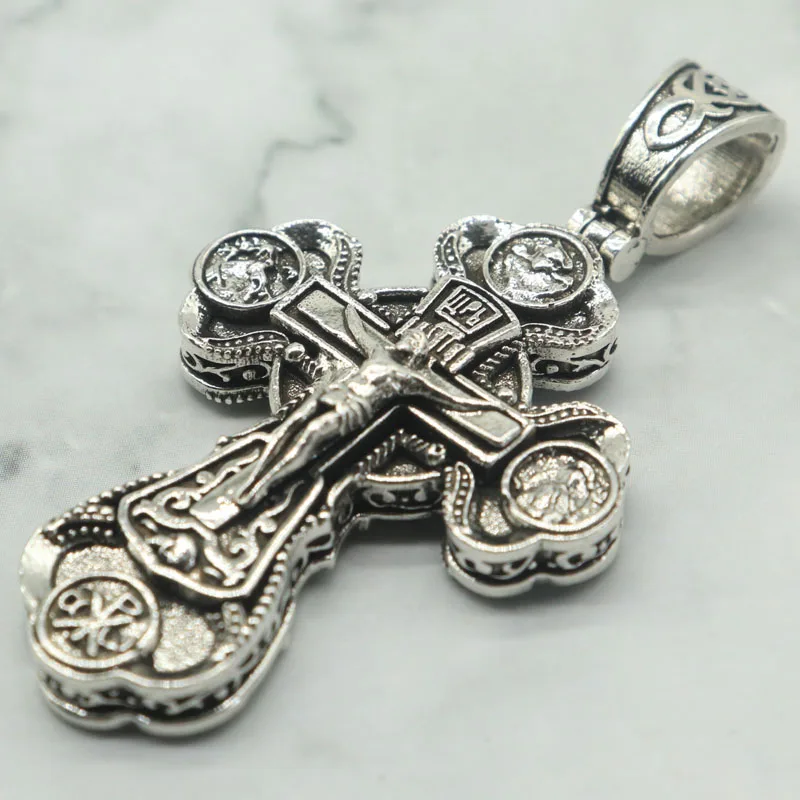 Buy 4 Get 1 Free 14g This Orthodox Cross Silver Pendant encompassing the watchful presence of the Virgin Mary and the saints
Buy 4 Get 1 Free 14g This Orthodox Cross Silver Pendant encompassing the watchful presence of the Virgin Mary and the saints