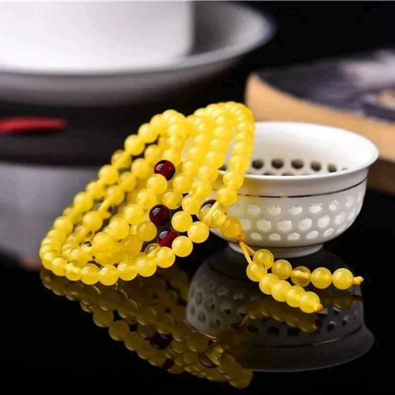 New Beeswax Amber 108 Buddha Beads Men's and Women's Bracelet National Style Explosion Natural Bangle Bracelet Homme
New Beeswax Amber 108 Buddha Beads Men's and Women's Bracelet National Style Explosion Natural Bangle Bracelet Homme