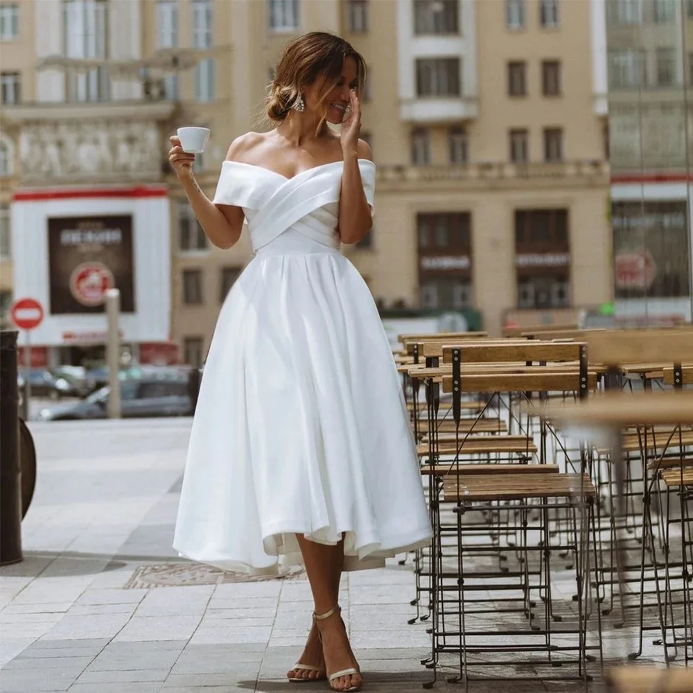 Short Satin Wedding Dresses A-line Cross Bridal Gown Simple Vintage Lace Up Tea-Length Off The Shoulder Robe De Mariée
Short Satin Wedding Dresses A-line Cross Bridal Gown Simple Vintage Lace Up Tea-Length Off The Shoulder Robe De Mariée