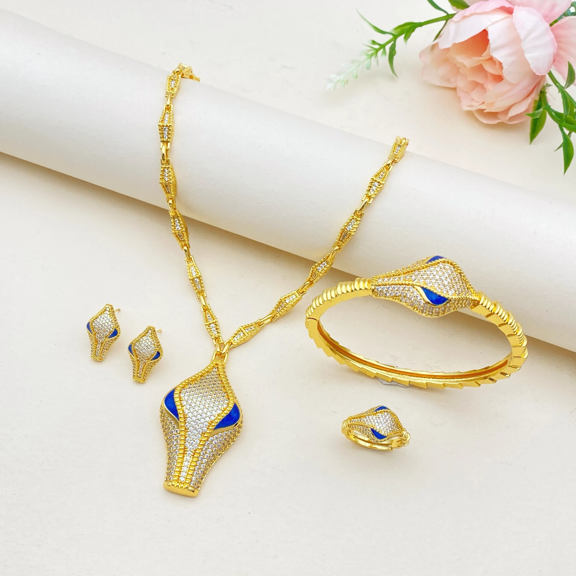 Flora Bestseller Gold Plated Snake Head Zircon Jewelry Set - 4Pcs Women's Fashion Necklace Bracelet Ring Earrings for Party
Flora Bestseller Gold Plated Snake Head Zircon Jewelry Set - 4Pcs Women's Fashion Necklace Bracelet Ring Earrings for Party