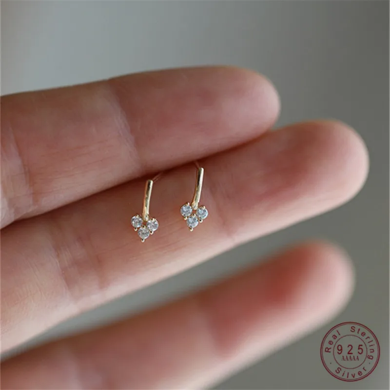 925 Sterling Silver Plated 14k Gold Three Zircon Heart Stud Earrings for Women Korean Temperament Jewelry Accessories
925 Sterling Silver Plated 14k Gold Three Zircon Heart Stud Earrings for Women Korean Temperament Jewelry Accessories