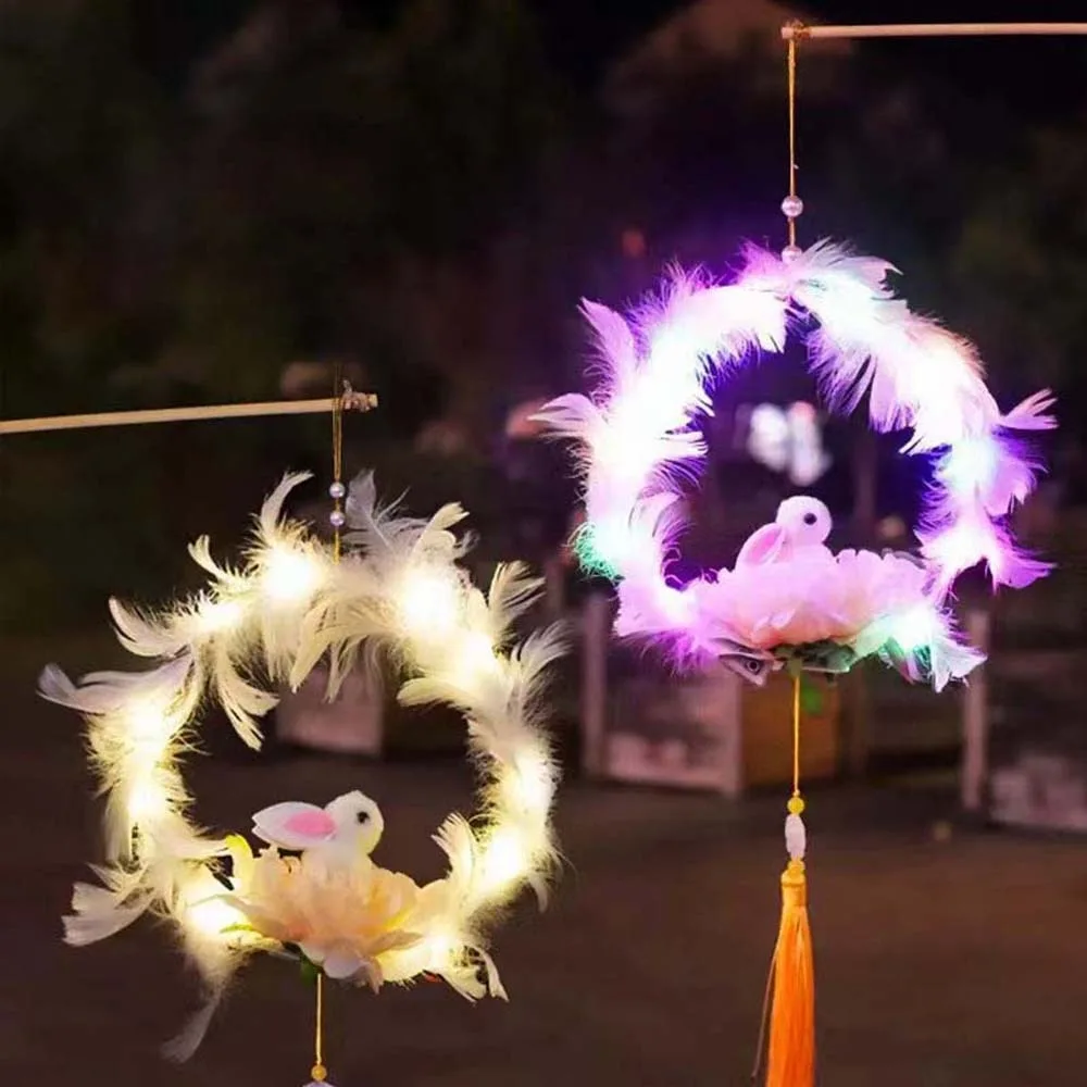 Handmade Children's Rabbit Lantern Handheld Glowing Osmanthus Flower Lanterns Intangible Cultural Blessings Feather Bunny Lamp 
Handmade Children's Rabbit Lantern Handheld Glowing Osmanthus Flower Lanterns Intangible Cultural Blessings Feather Bunny Lamp