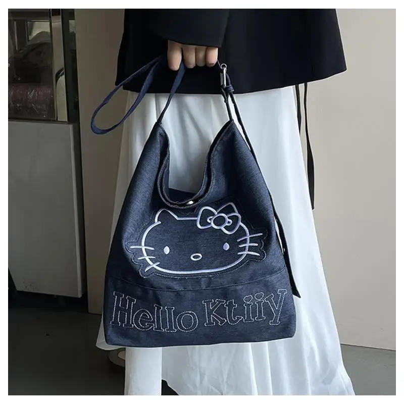 Sanrio Hello Kitty Girl Denim Handbag Cartoon Cute Large Capacity Student Bucket Bag Kawaii Fashion Travel Bag Shoulder Bag y2k
Sanrio Hello Kitty Girl Denim Handbag Cartoon Cute Large Capacity Student Bucket Bag Kawaii Fashion Travel Bag Shoulder Bag y2k
