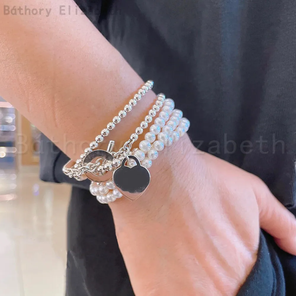 2024 New Fashion Europe America Silver Classic Pearl Chain Necklaces Luxury Woman High Quality Designer Brand Vintage Jewelry
2024 New Fashion Europe America Silver Classic Pearl Chain Necklaces Luxury Woman High Quality Designer Brand Vintage Jewelry