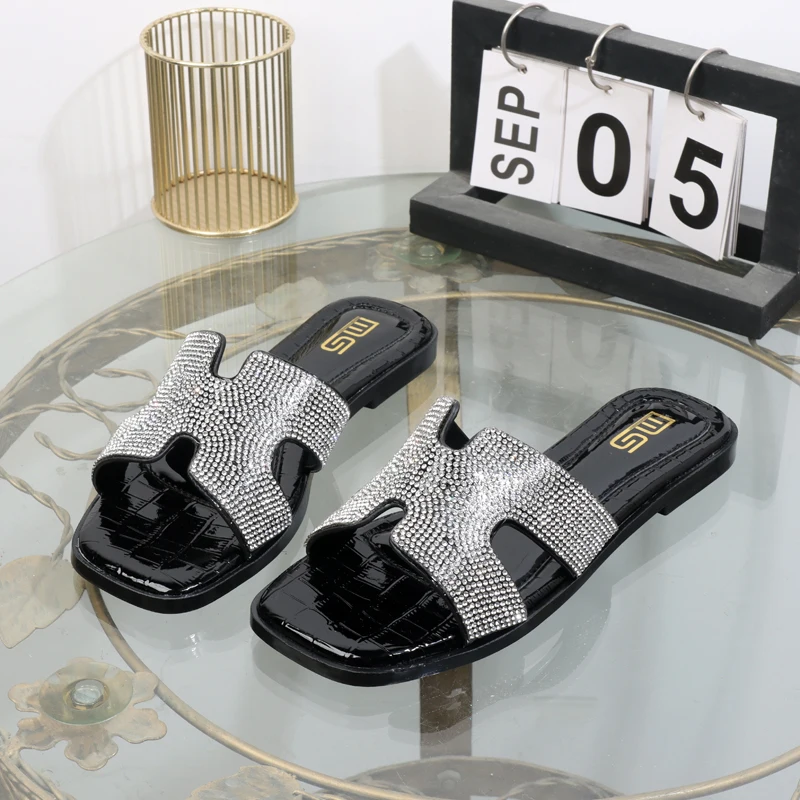 Fashion wear flat slippers 2025 new word sandals high value sandals non-slip women's shoes rhinestone square toes slippers
Fashion wear flat slippers 2025 new word sandals high value sandals non-slip women's shoes rhinestone square toes slippers