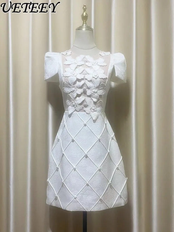 2025 Summer 3D Floral Pattern Stitching Niche Plaid Mini Dress Women Chic Beads Buckle Bubble Short-sleeved Dress Office Ladies 
2025 Summer 3D Floral Pattern Stitching Niche Plaid Mini Dress Women Chic Beads Buckle Bubble Short-sleeved Dress Office Ladies