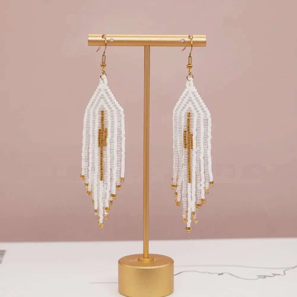 Beaded earrings Individuality Fashion Simple Hand knitting Tassel Bohemia Female Geometry Rice bead earrings
Beaded earrings Individuality Fashion Simple Hand knitting Tassel Bohemia Female Geometry Rice bead earrings