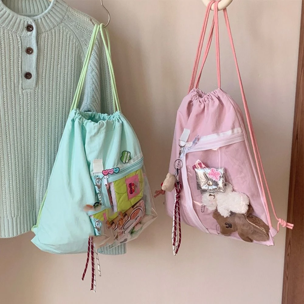 Transparent Pocket Drawstring Backpack Large Capacity Handheld Bag Korean Style Itabag Lightweight Fashion Design Shoulder Bag
Transparent Pocket Drawstring Backpack Large Capacity Handheld Bag Korean Style Itabag Lightweight Fashion Design Shoulder Bag
