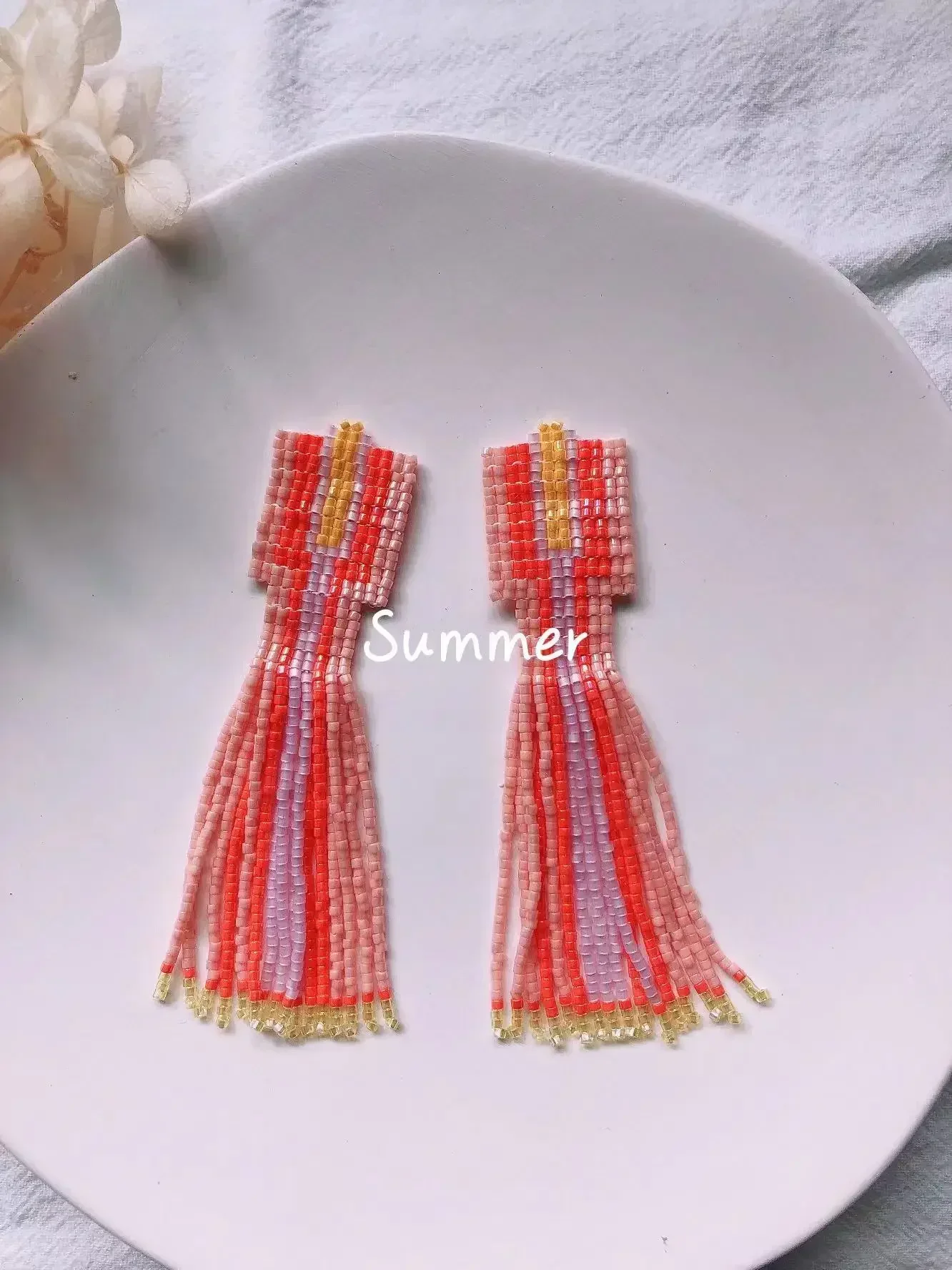 Beaded earrings Rainbow Tassel Hand knitting Alloy Originality Bohemia Tide Versatile Simple Female Rice bead earrings
Beaded earrings Rainbow Tassel Hand knitting Alloy Originality Bohemia Tide Versatile Simple Female Rice bead earrings
