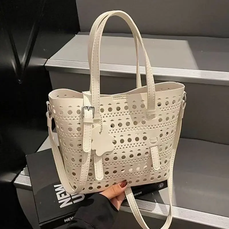 White Big-capacity Hollow Tote Bag Women 2026 Explosion Light Luxury Niche High-end Single Shoulder Pack Armpit Summer Package
White Big-capacity Hollow Tote Bag Women 2026 Explosion Light Luxury Niche High-end Single Shoulder Pack Armpit Summer Package