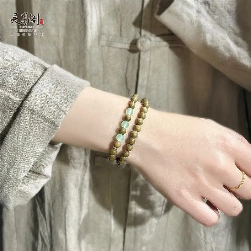 Браслет из натурального зеленого сандалового дерева, женский двойной круг, пластина из сандалового дерева, деревянные народные бусины Будды, мужские ручные четки
Браслет из натурального зеленого сандалового дерева, женский двойной круг, пластина из сандалового дерева, деревянные народные бусины Будды, мужские ручные четки