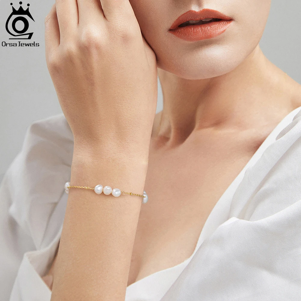 ORSA JEWELS Женские браслеты из бисера с жемчугом в стиле барокко, натуральный пресноводный жемчуг, позолоченный 14 К, браслет на руку, тонкая цепочка GPB22
ORSA JEWELS Женские браслеты из бисера с жемчугом в стиле барокко, натуральный пресноводный жемчуг, позолоченный 14 К, браслет на руку, тонкая цепочка GPB22