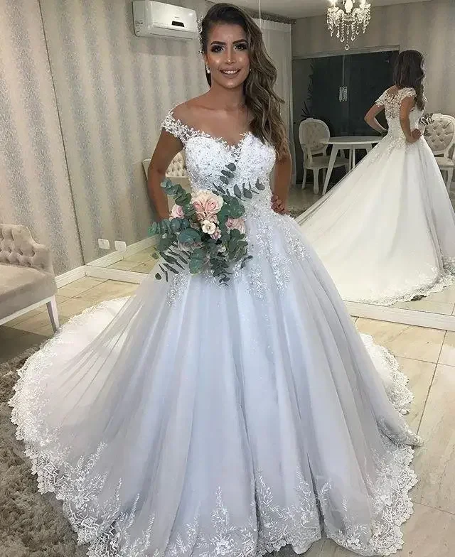 Customized White Wedding Dresses Puff A-Line African Bridal Wedding Gowns 2023 Lace Appliques Beaded Elegant Wedding Wear Cap Sl
Customized White Wedding Dresses Puff A-Line African Bridal Wedding Gowns 2023 Lace Appliques Beaded Elegant Wedding Wear Cap Sl
