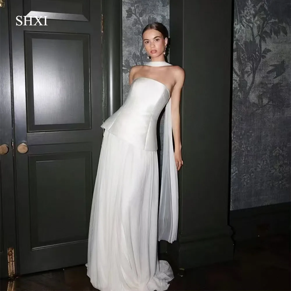 SHXI Elegant Strapless Wedding Dresses Customized Sleeveless Satin Tulle A Line Bridal Gown Backless Floor Beach Bride Dress
SHXI Elegant Strapless Wedding Dresses Customized Sleeveless Satin Tulle A Line Bridal Gown Backless Floor Beach Bride Dress