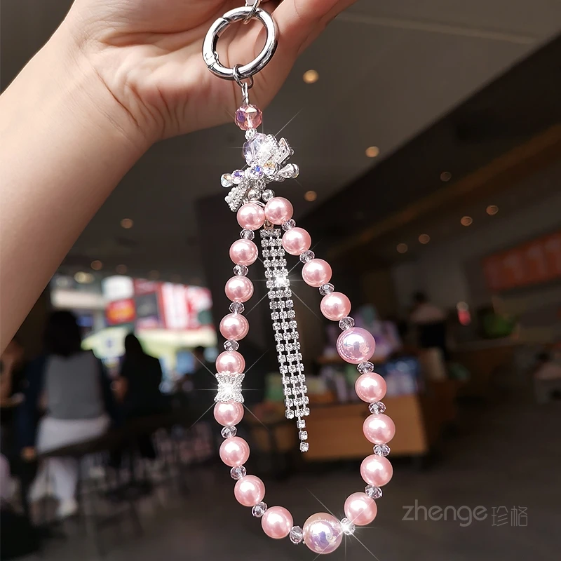 Women Fashion Bling Rhinestone Bow Phone Chain Pearl Beaded Hand Wrist Lanyard Strap
Women Fashion Bling Rhinestone Bow Phone Chain Pearl Beaded Hand Wrist Lanyard Strap