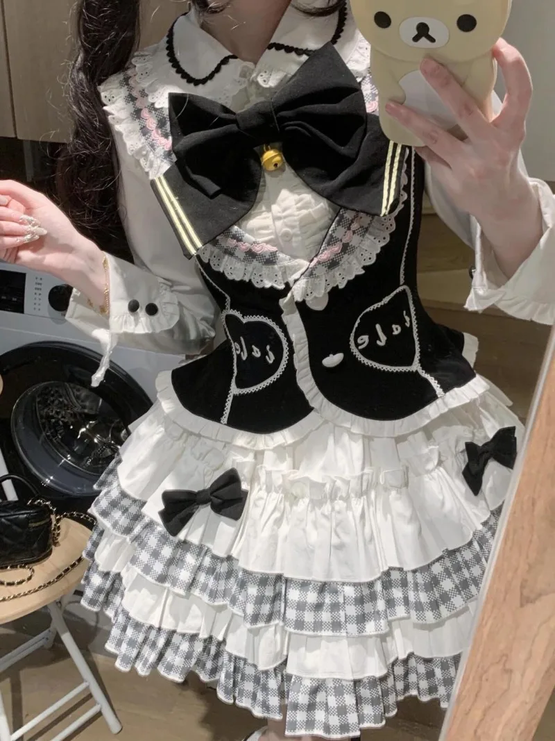 Preppy Style Korean Sweet Gothic Black Bow Slimming Shirt/vest/patchwork Plaid Lolita Puffy Skirt Three Sets Womens Outifits
Preppy Style Korean Sweet Gothic Black Bow Slimming Shirt/vest/patchwork Plaid Lolita Puffy Skirt Three Sets Womens Outifits