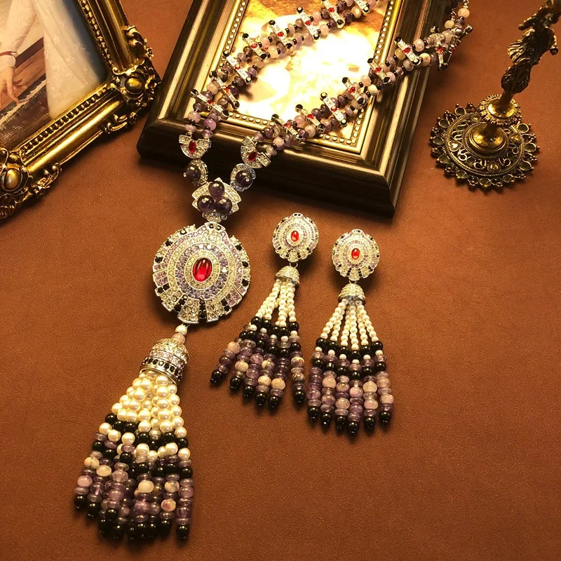 Retro tassel earrings necklace versatile exquisite fashion amethyst bead design pendant jewelry
Retro tassel earrings necklace versatile exquisite fashion amethyst bead design pendant jewelry