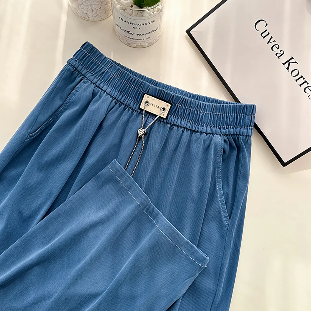 Casual Loose Thin Denim Pants for Women Summer Fashion Chains Drawstring Elastic Waist Jeans Ice Silk Straight Wide Leg Pants
Casual Loose Thin Denim Pants for Women Summer Fashion Chains Drawstring Elastic Waist Jeans Ice Silk Straight Wide Leg Pants