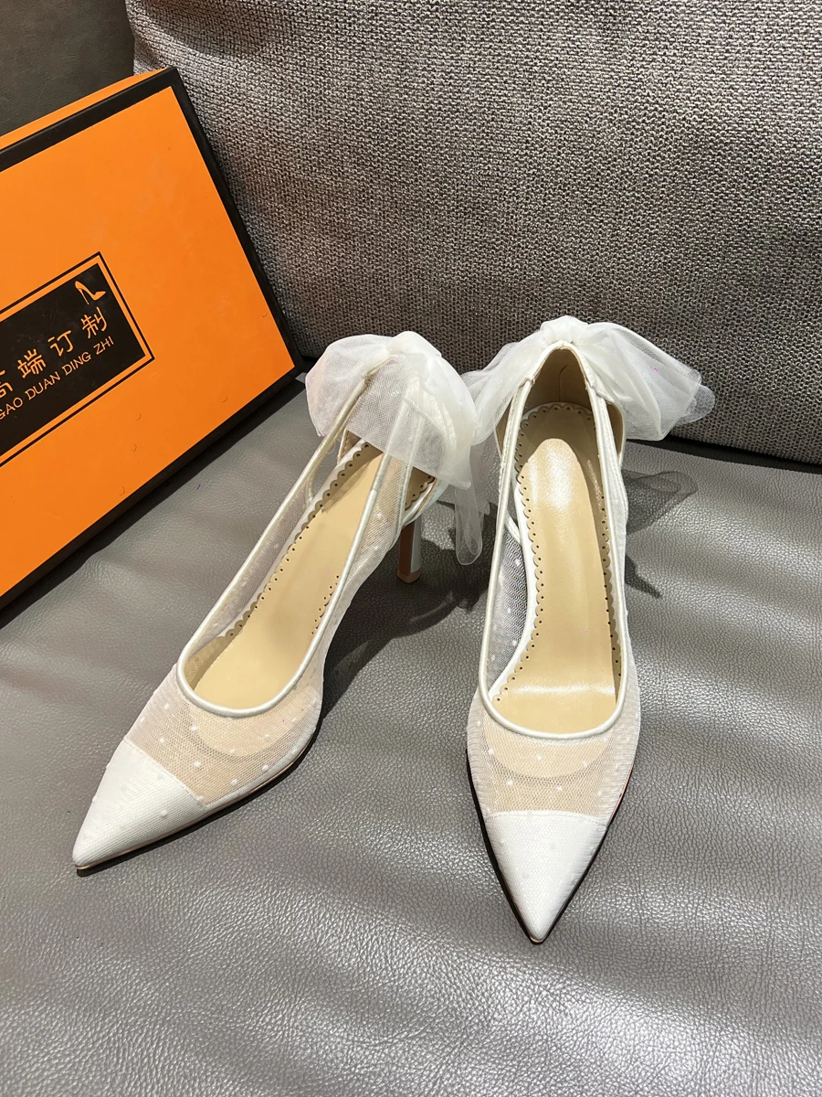 2025 French white mesh wedding shoes, women's bridal shoes, lace pointed slender high heels, shallow mouth single shoe sandals
2025 French white mesh wedding shoes, women's bridal shoes, lace pointed slender high heels, shallow mouth single shoe sandals