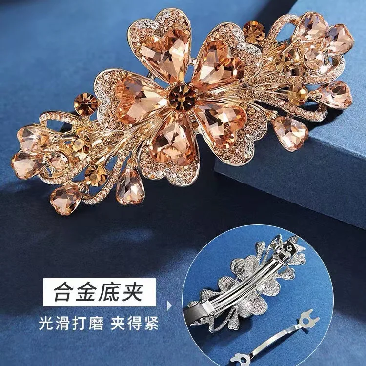 Fashion love rhinestone hairpin, high-end sense, exquisite large spring clip, half hair clip on the back of the head, headgear.
Fashion love rhinestone hairpin, high-end sense, exquisite large spring clip, half hair clip on the back of the head, headgear.