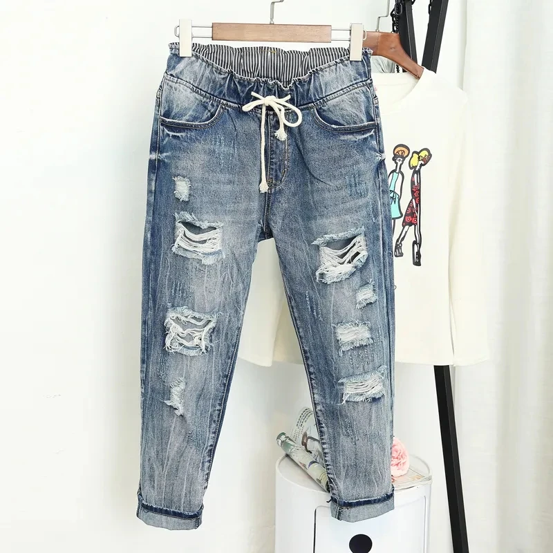 Spring Summe Large Size Mom Jeans Woman Elastic High Waist Baggy Jeans for Women Denim Ripped Jeans Female Loose Harem Pants
Spring Summe Large Size Mom Jeans Woman Elastic High Waist Baggy Jeans for Women Denim Ripped Jeans Female Loose Harem Pants