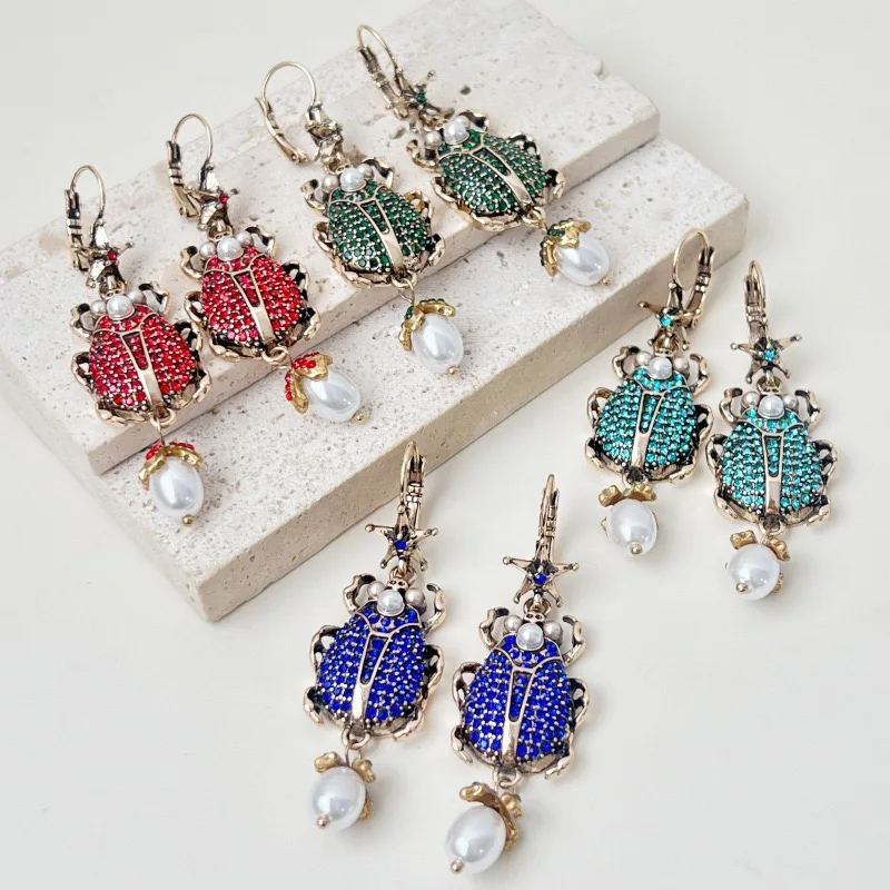 Retro Color Alloy Inlaid Rhinestone Insect Pearl Earrings Elegant Women Fashion Dangle Earrings Daily Wedding Accessories
Retro Color Alloy Inlaid Rhinestone Insect Pearl Earrings Elegant Women Fashion Dangle Earrings Daily Wedding Accessories