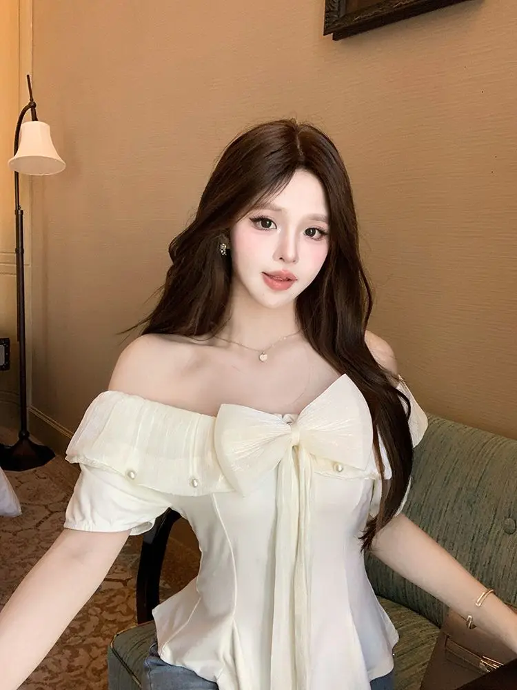 Korejpaa 2021, летняя женская рубашка Spicy Girl, рубашки с открытыми плечами и оборками, милые утягивающие топы с короткими рукавами Mujer
Korejpaa 2021, летняя женская рубашка Spicy Girl, рубашки с открытыми плечами и оборками, милые утягивающие топы с короткими рукавами Mujer