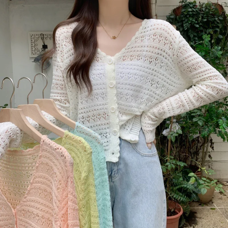 V-neck long-sleeved cardigan jacket sun protection cardigan outer wear thin jacket women's summer hollow knitted jacket
V-neck long-sleeved cardigan jacket sun protection cardigan outer wear thin jacket women's summer hollow knitted jacket