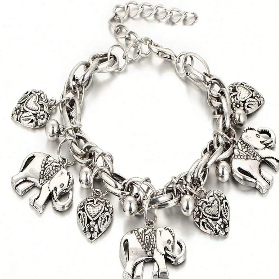 Antique-Style Alloy Charm Bracelet With Detailed Elephant And Floral Heart Pendants On Link Chain For Women
Antique-Style Alloy Charm Bracelet With Detailed Elephant And Floral Heart Pendants On Link Chain For Women