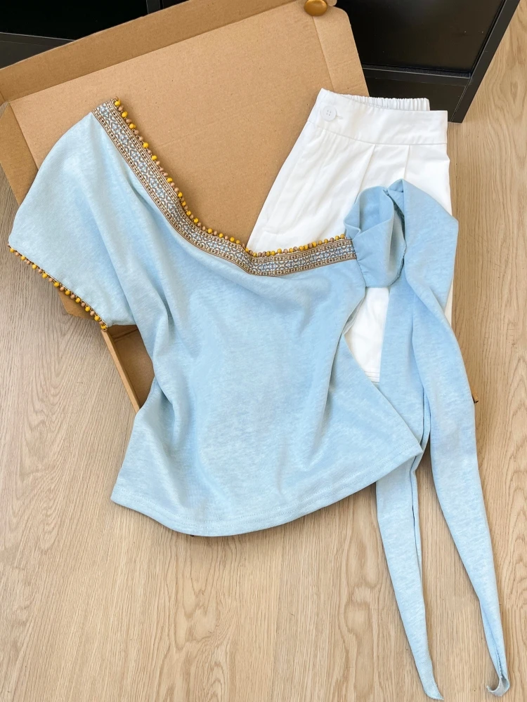 Blue Beaded Shoulder T-Shirt Women's Summer Style Sexy Slim Fit Short Sleeve Top Korean Version Commute Style Pure Color
Blue Beaded Shoulder T-Shirt Women's Summer Style Sexy Slim Fit Short Sleeve Top Korean Version Commute Style Pure Color