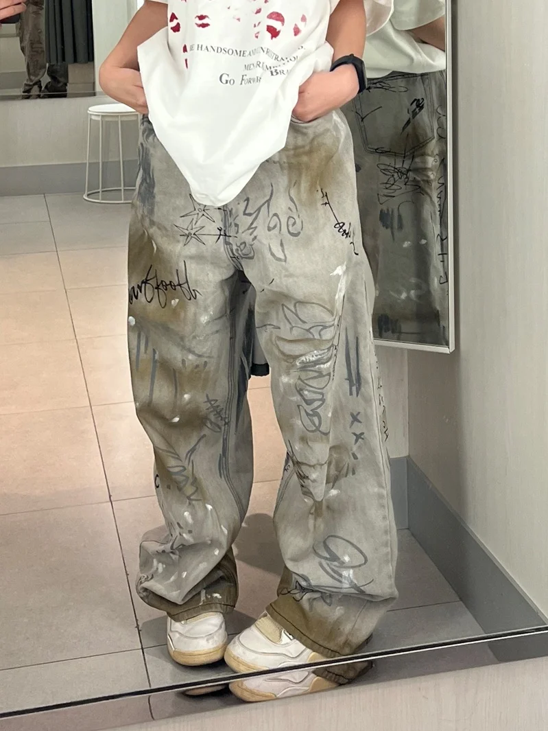 Retro American Punk Graffiti Washed Denim Jeans Loose Wide Leg Casual Pants for Men And Women Summer Slimming Comfortable Jeans
Retro American Punk Graffiti Washed Denim Jeans Loose Wide Leg Casual Pants for Men And Women Summer Slimming Comfortable Jeans