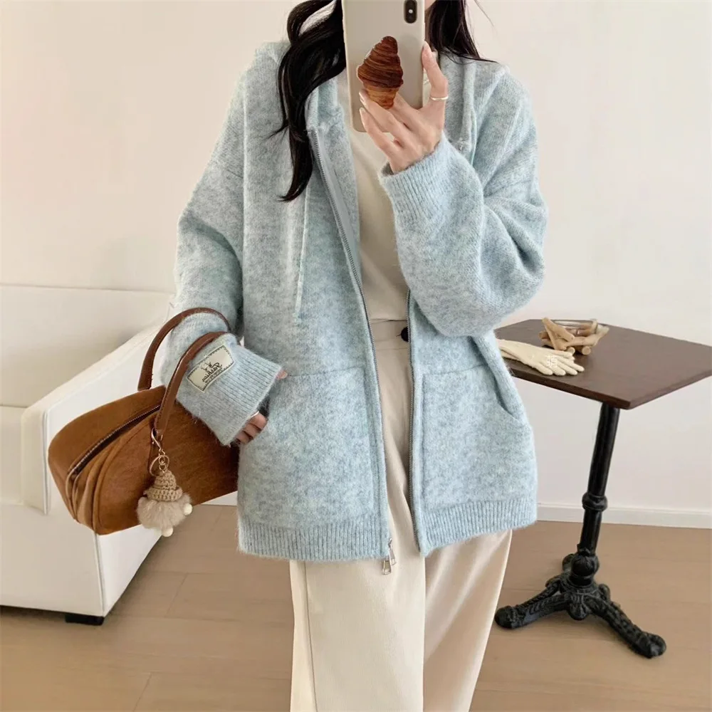 Soft and Sticky Hooded Zipper Cardigan Jacket for Women's Autumn and Winter New Style, Loose and Thick Casual Knitted Top
Soft and Sticky Hooded Zipper Cardigan Jacket for Women's Autumn and Winter New Style, Loose and Thick Casual Knitted Top