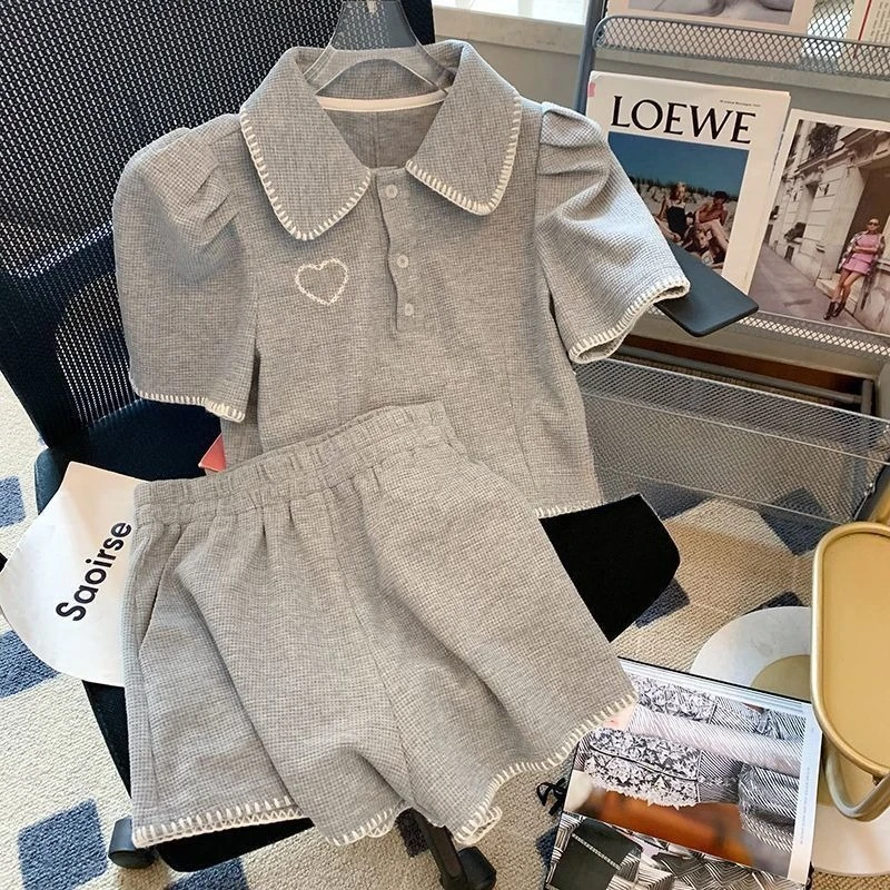 Spring Summer Korean Fashion Grey Women's Two Pieces Set Puff Sleeve Polo Collar Tops + Casual Shorts Preppy Style Woman Clothes
Spring Summer Korean Fashion Grey Women's Two Pieces Set Puff Sleeve Polo Collar Tops + Casual Shorts Preppy Style Woman Clothes
