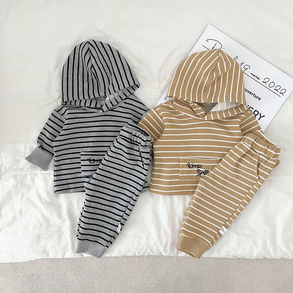Korean Children Clothes Autumn Striped Hooded Sports Suit Baby Boy Girl Leisure Sweatshirt Pants 2Pcs Letter Long Sleeve Outfits
Korean Children Clothes Autumn Striped Hooded Sports Suit Baby Boy Girl Leisure Sweatshirt Pants 2Pcs Letter Long Sleeve Outfits
