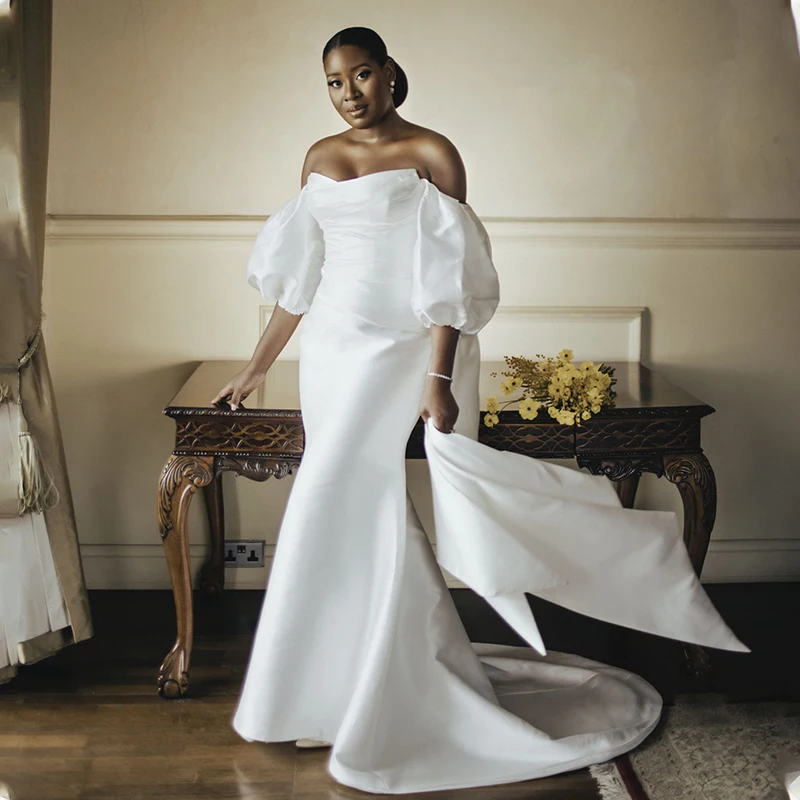 Vintage Puff Sleeves African Mermaid Wedding Dresses Scoop Neckling With Detachable Train Custom Made Bridal Grown
Vintage Puff Sleeves African Mermaid Wedding Dresses Scoop Neckling With Detachable Train Custom Made Bridal Grown