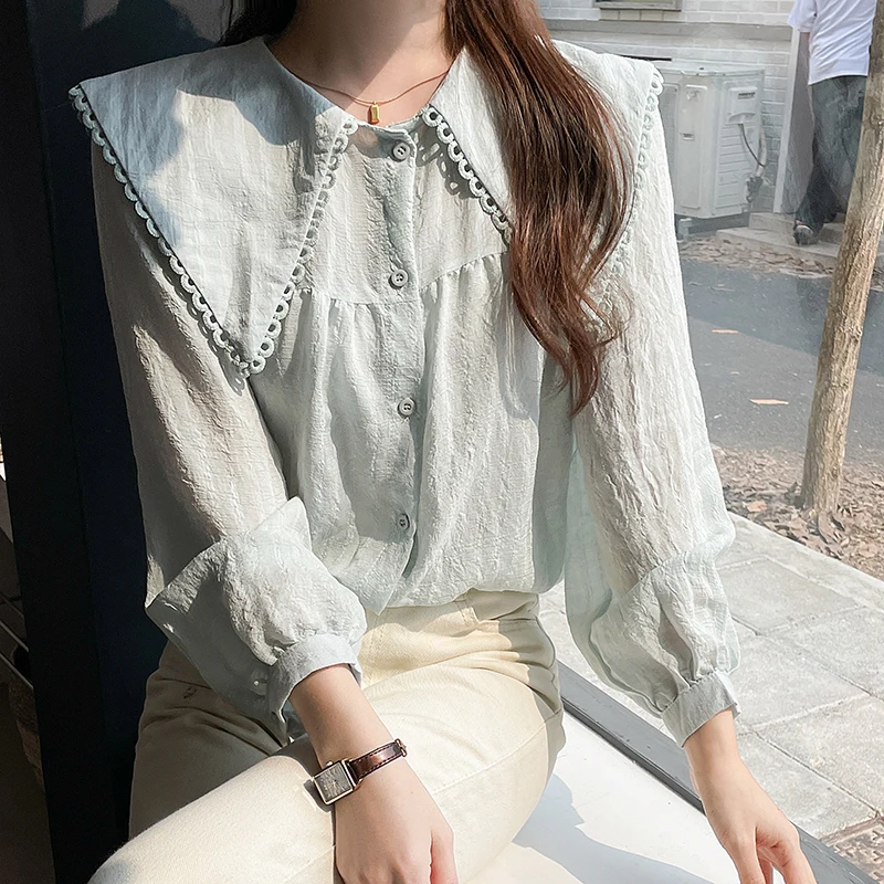 Spring and summer 2023 new doll collar temperament long-sleeved shirt Women's fashionable loose bottom top
Spring and summer 2023 new doll collar temperament long-sleeved shirt Women's fashionable loose bottom top