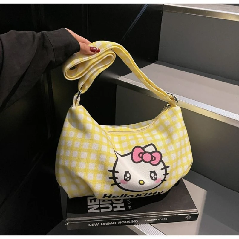 Сумка-тоут Sanrio KT из клетчатого холста, большая вместимость, легкая, на одно плечо, через плечо, новейшая модель 2026 года, свежий и милый дизайн.
Сумка-тоут Sanrio KT из клетчатого холста, большая вместимость, легкая, на одно плечо, через плечо, новейшая модель 2026 года, свежий и милый дизайн.