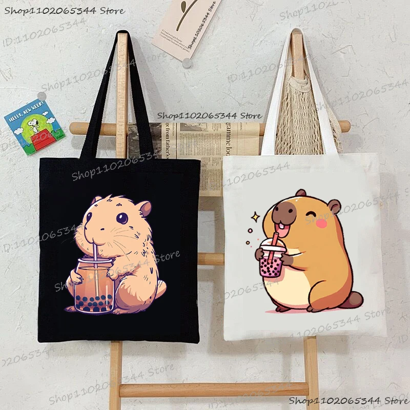 Cute Capybara Drinking Boba Bubble Tea Print Women Foldable Canvas Shoulder Bag Cartoon Capybara Series Student Shopping HandBag
Cute Capybara Drinking Boba Bubble Tea Print Women Foldable Canvas Shoulder Bag Cartoon Capybara Series Student Shopping HandBag